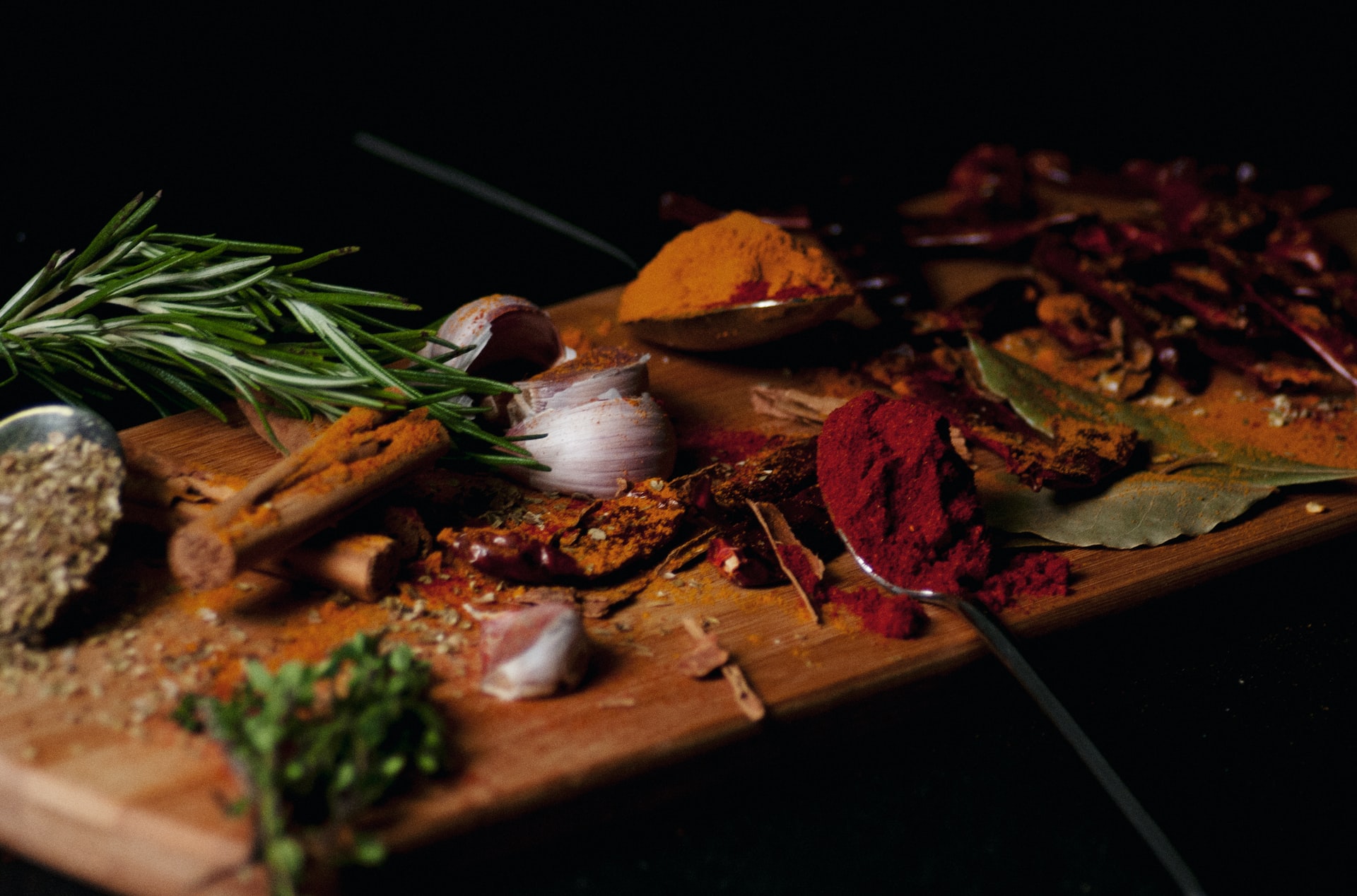 herbs and spices on chopping board